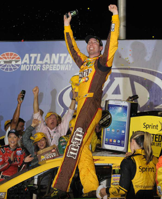 Illustration for article titled Bristol Was A Warmup: Kyle Busch Takes Atlanta, Get's the M&M Shower